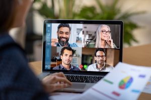 A diverse group of four people on a conference call displayed on a laptop. Image for ResultsResourcing free quiz for how your workforce is impacting your growth.