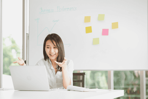 A freelancer speaking with their freelance contact worker on how to grow their business. 