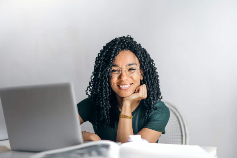 Woman smiling after finding the right freelancer